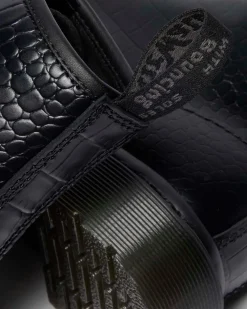 Boots 1460 en cuir gaufré croco in Noir