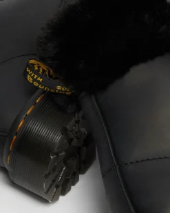 Boots 1460 Serena à Col Doublées de Fourrure Synthétique in Noir