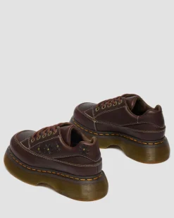 Chaussures Buzz en cuir Flower Grizzly à 5 œillets in Marron Foncé